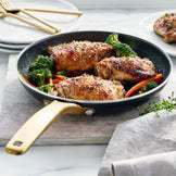 Black Cast Iron Frying Pan with Gold Ceramic Coating Handle