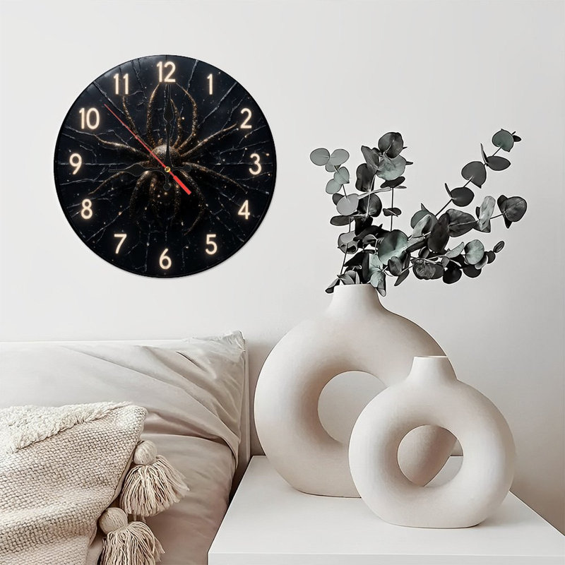 Horloge scintillante en forme d'araignée