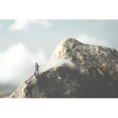 Man Climbing The Mountain by Francescoch - Wrapped Canvas Print