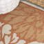 Tapis intérieur / extérieur à motif floral texturé orange / crème Zinnia-2098090152