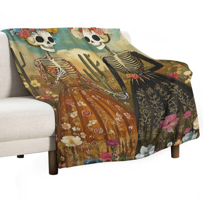 Jeté de flanelle de luxe en squelettes dans des robes à fleurs