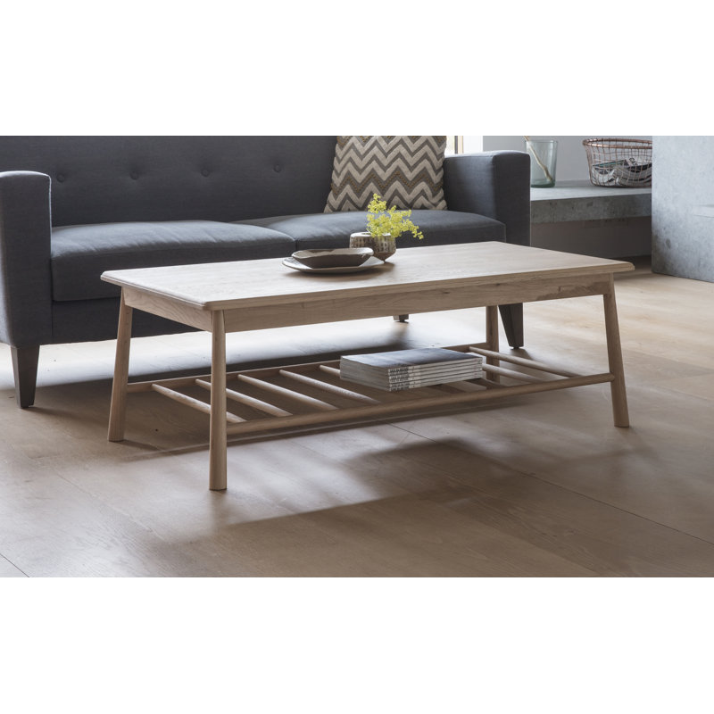 Emrich Solid Wood Four Leg Coffee Table with Storage