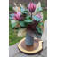 Protea arrangement dans un vase
