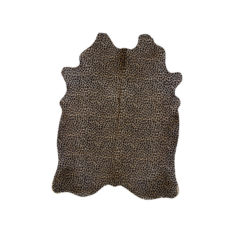 Lostwithiel Cowhide Animal Print Area Rug in Brown