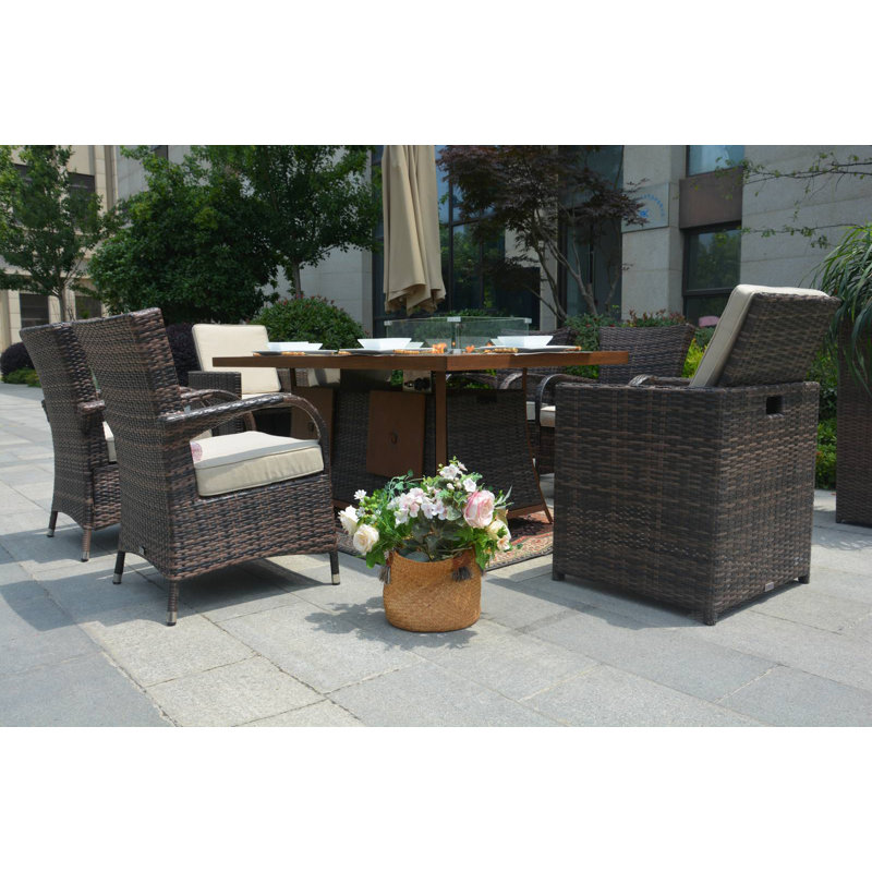 Betzaira 6 - Person Wicker Patio Dining Set with Rectangular Table , Cushions Included