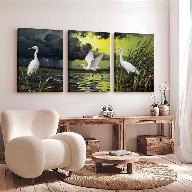 Ensemble de 3 tableaux sur toile tendue représentant un héron blanc dans un paysage marécageux, H 36 po x l 72 po