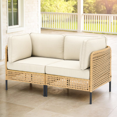 Mobilier de patio modulaire d'extérieur naturel avec coussins beiges, conception confortable et modulaire résistante aux intempéries, arrangement de style pour les jardins de balcons