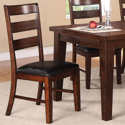 2 Brown Back Dining Chairs. Wood For Longevity. 250 Lbs Weight Capacity. Cushy Padded Seating With Leather-like Finish. Great Rooms. 19.16 In D X 23.6