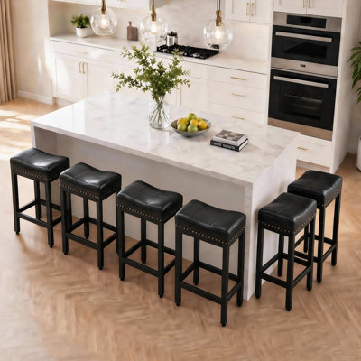 Michille Saddle Upholstered 24.21" Counter Stool