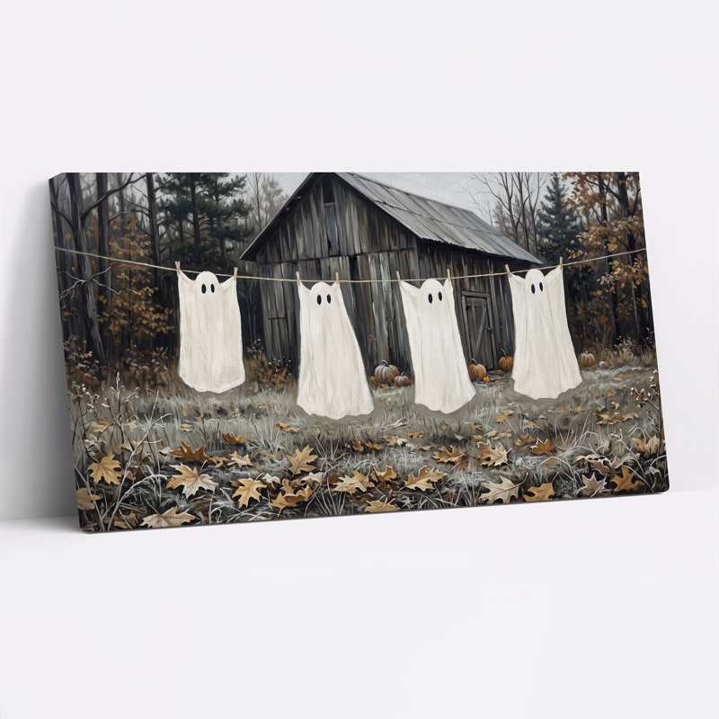Toile blanche fantôme suspendue à une corde à linge sur toile d'Halloween, L 46 po x H 24 po