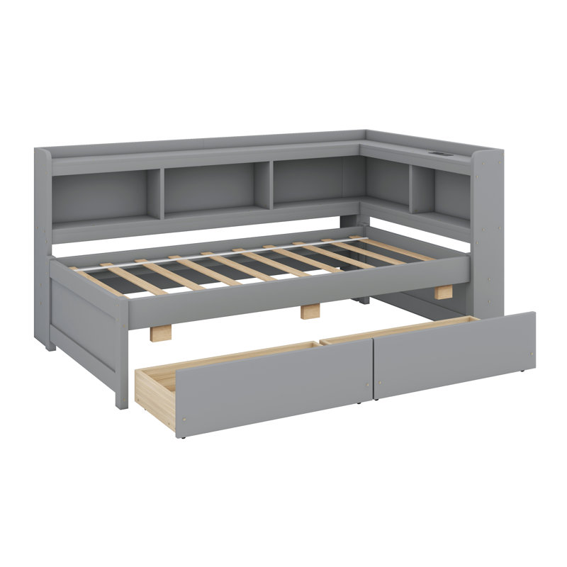 Structure de lit en L en bois massif avec bibliothèque intégrée, prises de courant intégrées, chargeurs USB et tiroirs de rangement