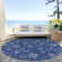 Machine Washable Indoor/Outdoor Christmas Snowflake Xhevrie Navy Rug