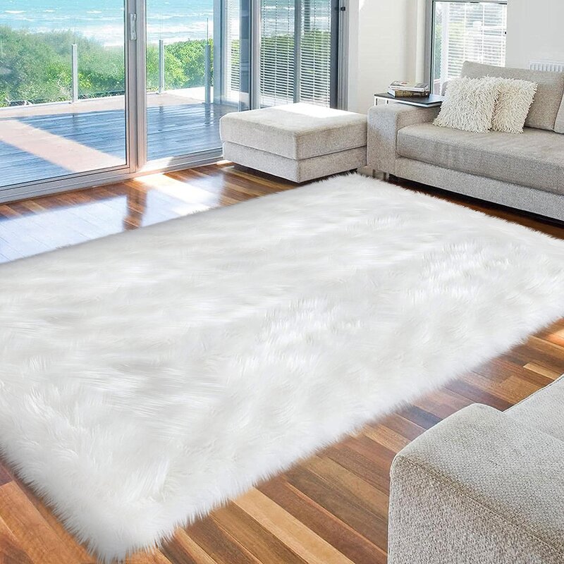 Everly Quinn Kemmi Faux Sheepskin White Rug & Reviews | Wayfair