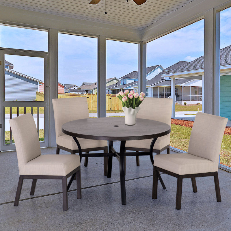 4 - Person Patio Dining Set with Round Table , Cushions Included