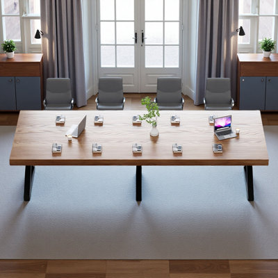 Walnut-colored rectangular solid wood conference by 17 Stories