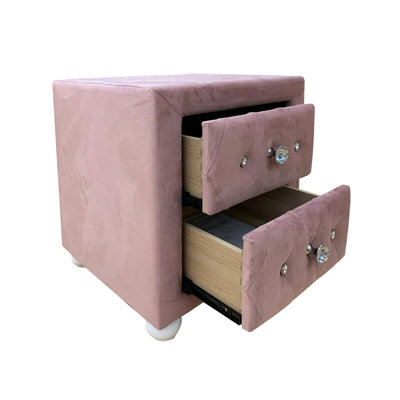 Table de chevet en tissu rose avec 2 tiroirs, pieds en bois blancs, fabrication en mousse et en panneaux de particules avec tiroirs à l'intérieur en bois tropical, poignées, pieds arrondis