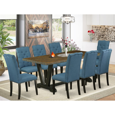 Ensemble de 9 pièces comprenant une table en bois jacobine vieillie et 8 chaises Parson en tissu bleu minéral avec dossier capitonné - Finition noire brossée