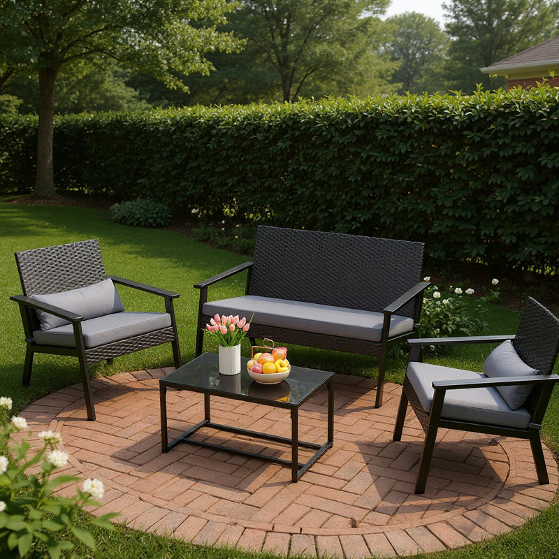 Ensemble de patio 4 pièces en osier 4 personnes - Causeuse, chaise et table basse avec coussins