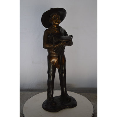 Marysville Cowboy Holding a Saddle Bronze Statue -  Size: 12"L x 11"W x 32"H.