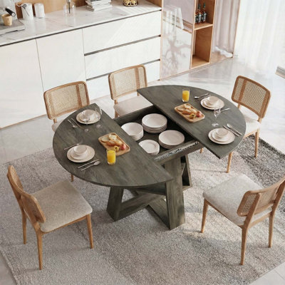 Table de salle à manger extensible ronde ovale avec des feuilles amovibles, conception peu encombrante pour 4 à 8 personnes