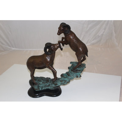 Denzel Two Rams on a rock Bronze Statue -  Size: 15"L x 8"W x 16"H.