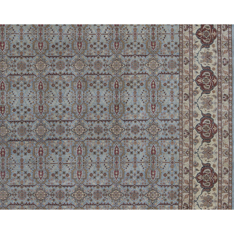 Tapis bleu et ivoire de haute qualité noué à la main