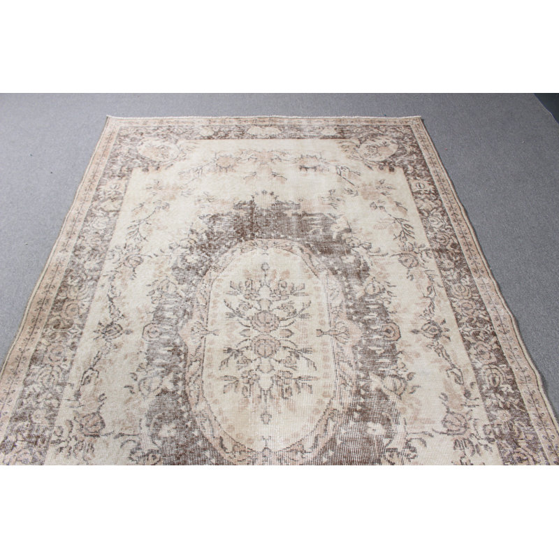 Grand tapis en laine beige beige à motif médaillon rétro idéal pour décorer le salon