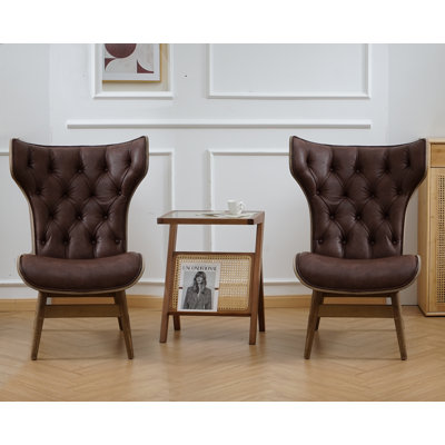 Fauteuil à oreilles capitonné Lexey