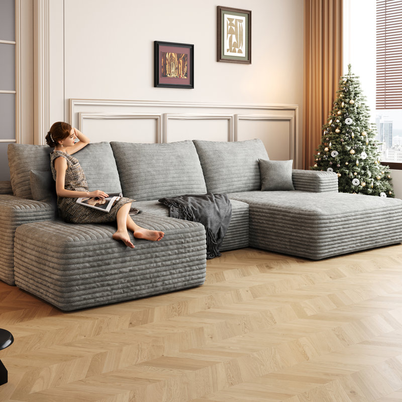 Canapé modulaire rembourré confortable avec repose-pieds, idéal pour les salons