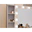 Bureau de coiffeuse moderne avec miroir lumineux et station de charge, parfait pour les amateurs de beauté et les espaces organisés