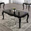 Table basse de style traditionnel avec pieds incurvés en bois massif