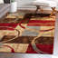Tapis multicolore à motif géométrique Adetomiwa-826113294