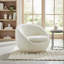 Chaise longue pivotante en laine crème, confortable et polyvalente.