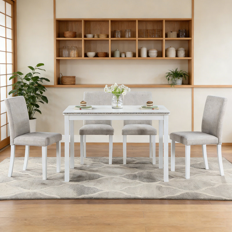 5 pièces en bois Stolz avec une table rectangulaire et 4 chaises rembourrées