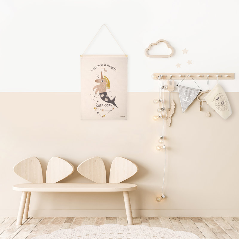 PETIT CAPRICORNE SUSPENDU AU MUR