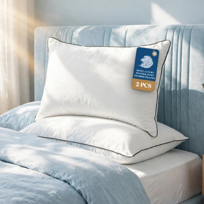 Oreillers en duvet d'oie doux et mi-ferme avec housse 100% coton biologique