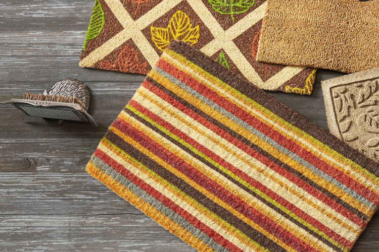 Red, yellow, brown striped doormat