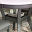 Ensemble de table ronde 5 pièces avec une table de salle à manger en faux marbre et quatre chaises en similicuir