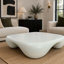 Table basse moderne en faux travertin texturé pour le salon / bureau-901062324