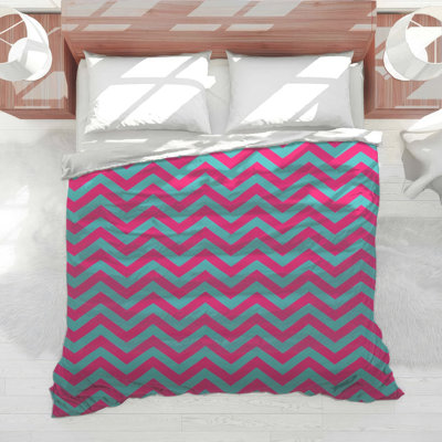 Édredon à chevrons rose et bleu
