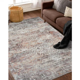 Tapis à motif de losanges délavé