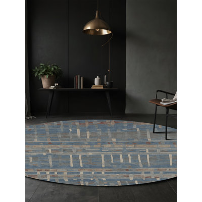 Tapis gris soyeux et moelleux