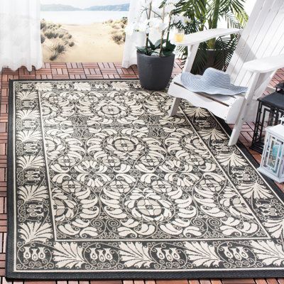 Arneshia Oriental Black/Beige Indoor/Outdoor Area Rug