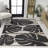 Colgin Classic Beach Stripe and Monstera Leaf Black/Beige Indoor/Outdoor Rug-741757542