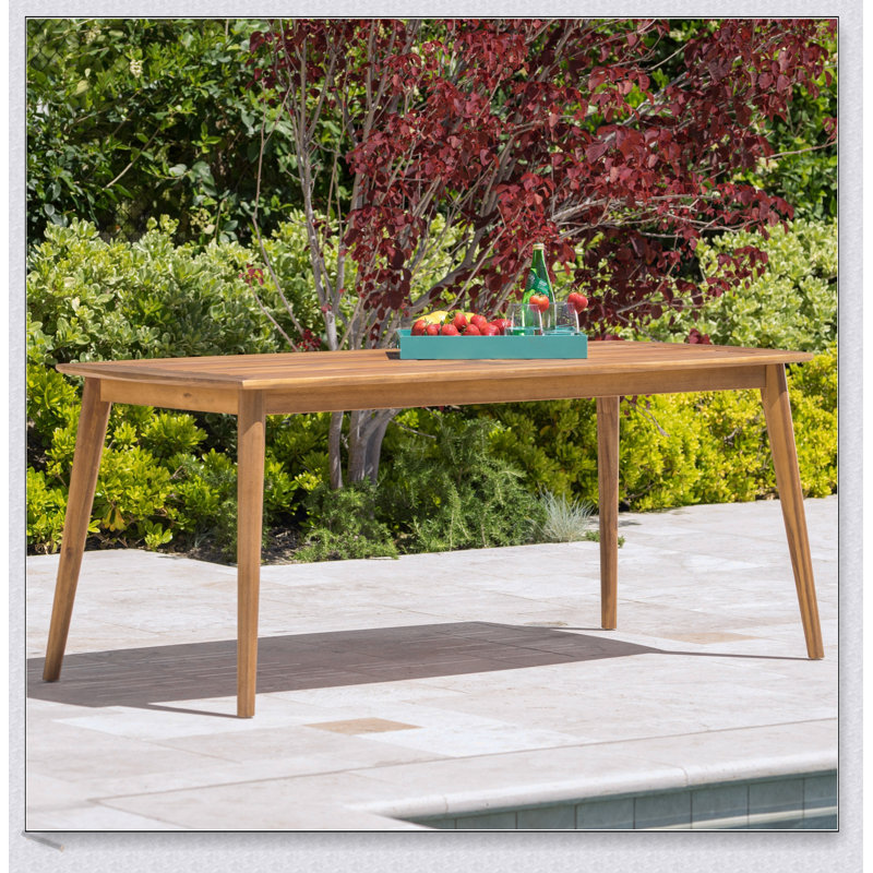 Table de salle à manger d'extérieur en bois d'acacia durable avec finition en teck pour un patio élégant et résistant aux intempéries