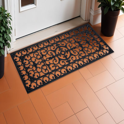 Tapis de porte d'extérieur en caoutchouc noir à motifs en volutes, 43 x 104 cm