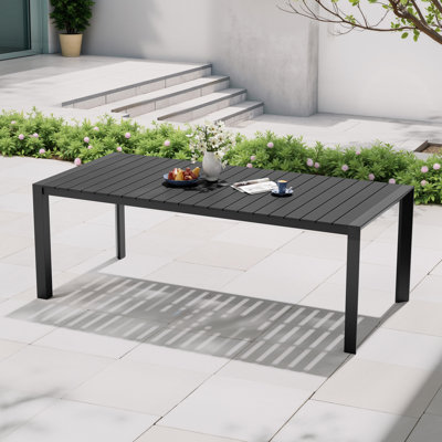 Rectangular Outdoor Dining Table with Umbrella Hole and Aluminum Frame by Latitude Run