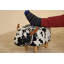 Lulu the Spotted Cow spotted black and white velvet footstool with wooden legs