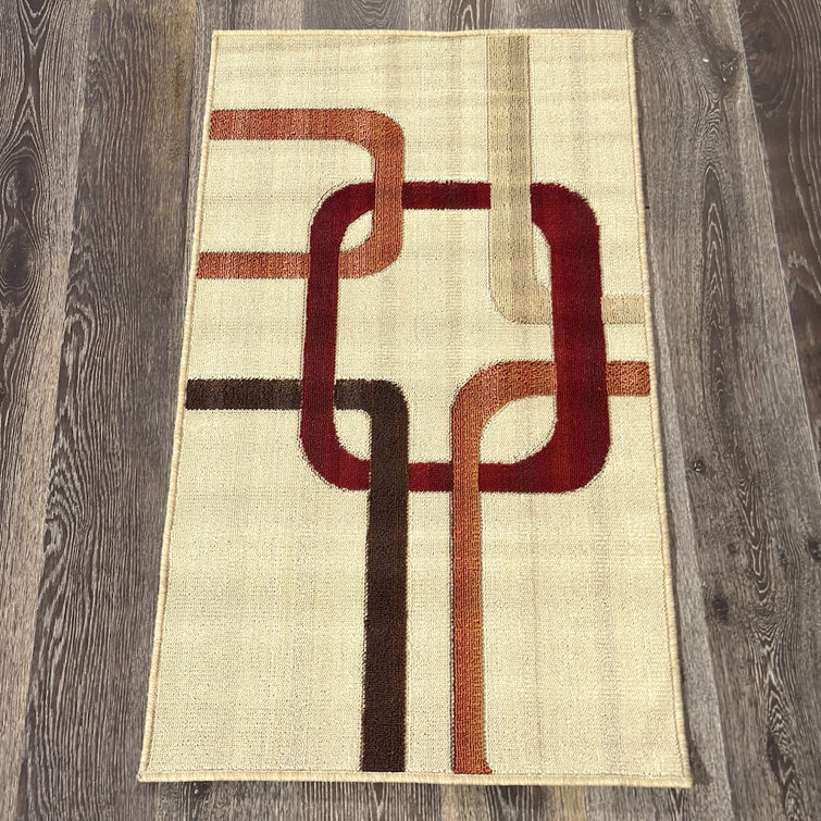 Tapis en polypropylène géométrique beige, taupe et brun clair Bunce
