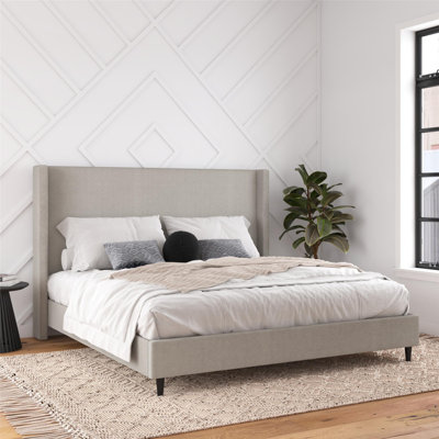 Mozter Upholstered Wingback Bed